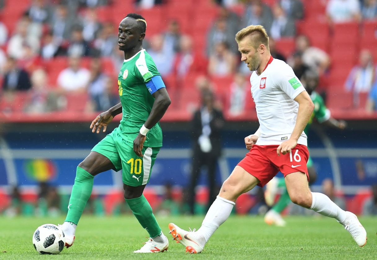 Senegal midfielder Sadio Mane (10) controls the ball against Poland midfielder Jakub Blaszczykowski (16). Pic: Tim Groothuis/Witters Sport via USA TODAY Sports
