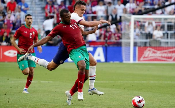 Morocco midfielder Ayoub El Kaabi (17) is fouled by the United States defender Aaron Long