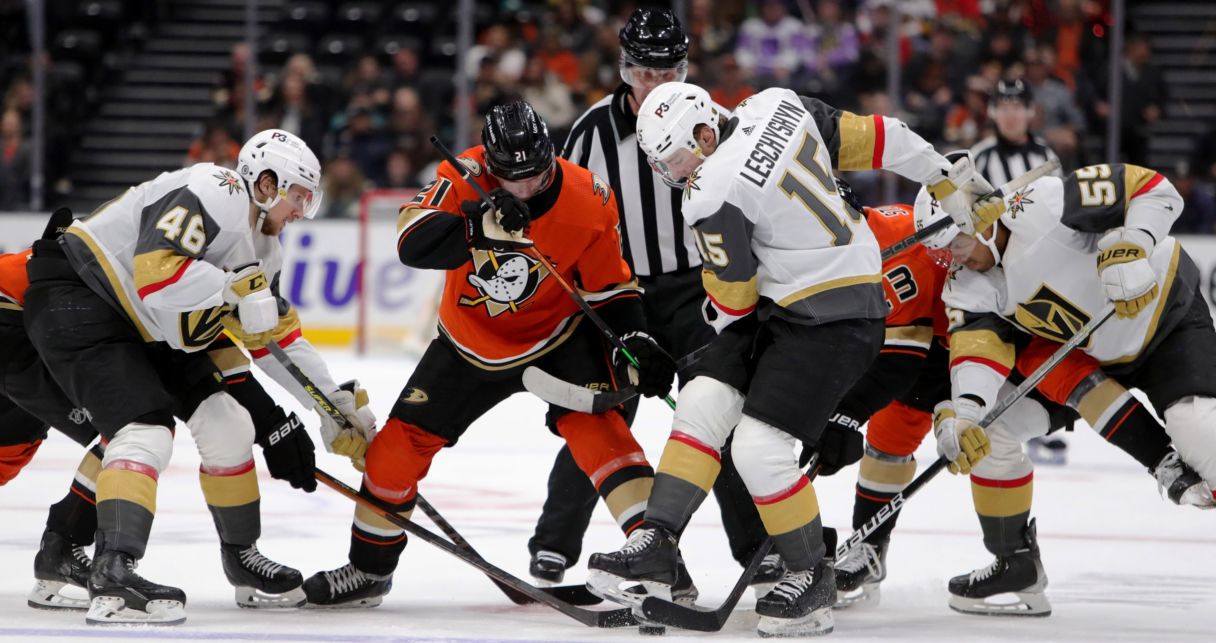 Vegas Golden Knights center Jake Leschyshyn (15) faces off against Vegas Golden Knights center Brett Howden (21) during the third period at Honda Center. The Golden Knights won 5-4. Mandatory Credit: Kiyoshi Mio-USA TODAY Sports