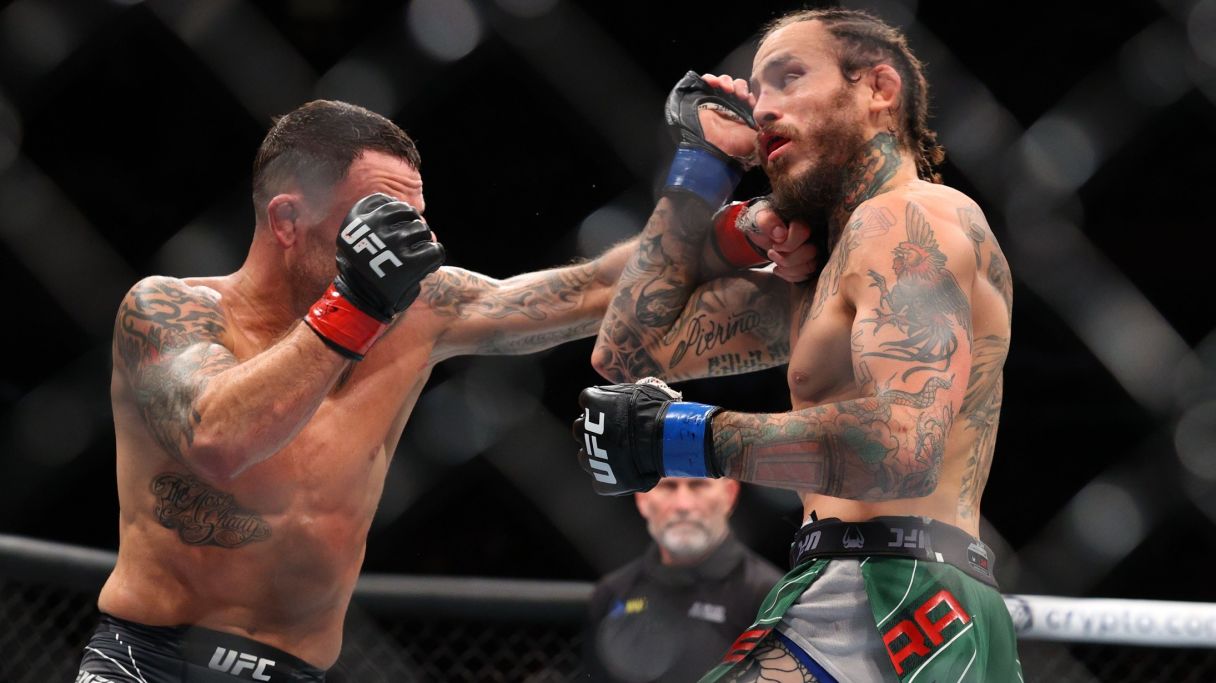 Marlon Vera (blue gloves) competes against Frankie Edgar (red gloves) during UFC 268 at Madison Square Garden. Mandatory Credit: Ed Mulholland-USA TODAY Sports