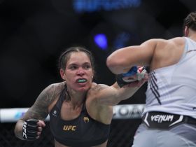 4:3 Amanda Nunes moves in with a hit against Julianna Pena during UFC 269 at T-Mobile Arena. Mandatory Credit: Stephen R. Sylvanie-USA TODAY Sports
