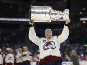 Colorado Avalanche defenseman Cale Makar celebrates with the Stanley Cup. © Geoff Burke-USA TODAY Sports