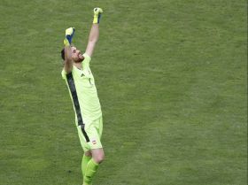 4:3 Spain goalkeeper Unai Simon (1) hug after defeating Japan in a men's soccer semifinal match during the Tokyo 2020 Olympic Summer Games at Saitama Stadium. Mandatory Credit: Yukihito Taguchi-USA TODAY Sports