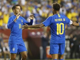 Brazil midfielder Philippe Coutinho celebrates with teammate Neymar. © Geoff Burke-USA TODAY Sports