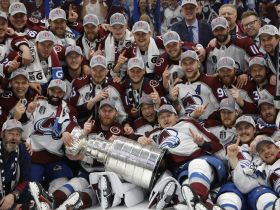4:3 The Colorado Avalanche pose for a team picture with the Stanley Cup after their game against the Tampa Bay Lightning in game six of the 2022 Stanley Cup Final at Amalie Arena. Mandatory Credit: Geoff Burke-USA TODAY Sports