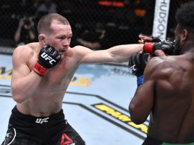 4:3 Petr Yan of Russia punches Aljamain Sterling in their UFC bantamweight championship fight during the UFC 259 event at UFC APEX on March 06, 2021 in Las Vegas, Nevada. Mandatory Credit: Jeff Bottari/Handout Photo via USA TODAY Sports