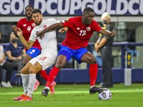 4:3 Costa Rica forward Joel Campbell (12) controls the ball as Canada midfielder Jonathan Osorio (21) defends during the first half of a CONCACAF Gold Cup quarterfinal soccer match at AT&T Stadium. Mandatory Credit: Kevin Jairaj-USA TODAY Sports