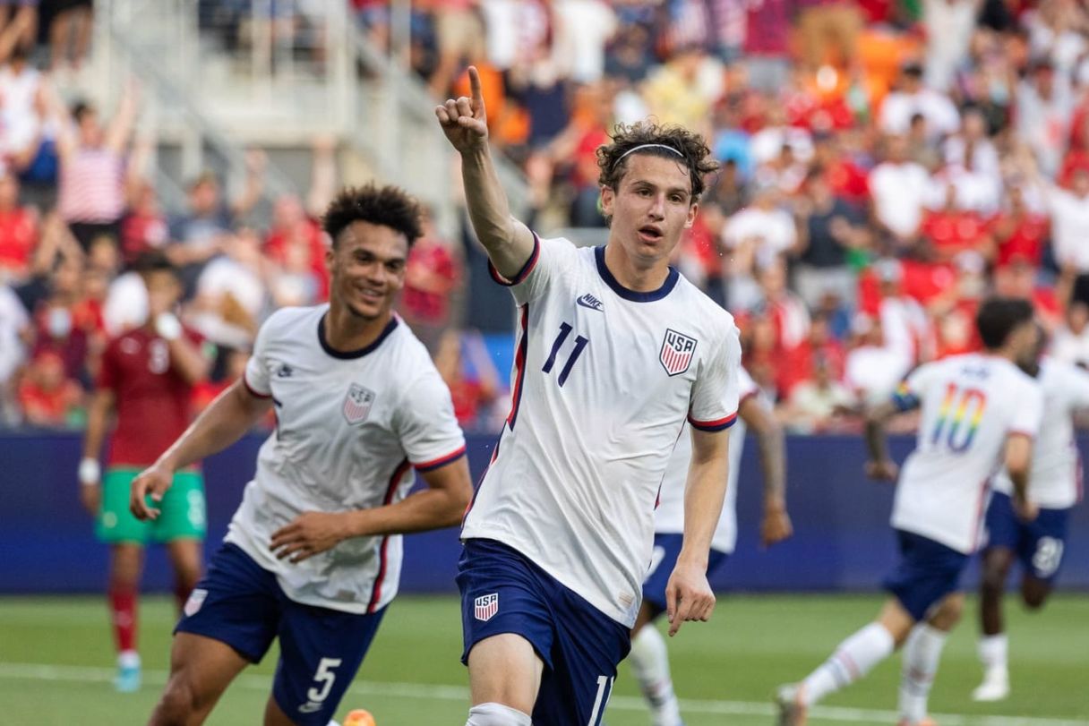 United States forward Brenden Aaronson celebrates his goal with the defender Antonee Robinson. © Trevor Ruszkowski-USA TODAY Sports