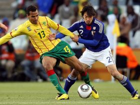 4:3 Eric Choupo-Moting battles for the ball with Japan midfielder Yuki Abe (2) during Group E play in the 2010 World Cup at Soccer City Stadium. Mandatory Credit: Christian Ort/GEPA via USA TODAY Sports
