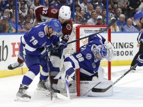 4:3 Andrei Vasilevskiy (88) makes a save on Colorado Avalanche left wing Gabriel Landeskog (92) as Lightning center Ross Colton (79) defends in game six of the 2022 Stanley Cup Final at Amalie Arena. Mandatory Credit: Geoff Burke-USA TODAY Sports