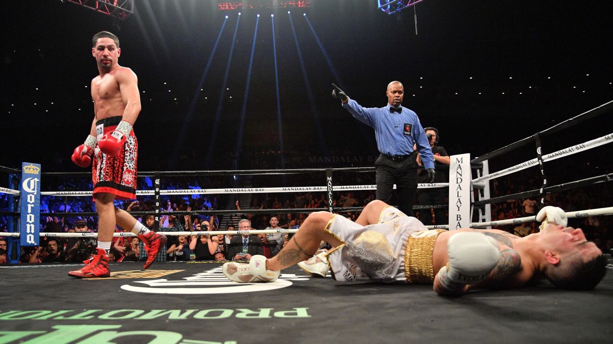 Feb 17, 2018; Las Vegas, NV, USA; Danny Garcia (red trunks) knocks out Brandon Rios (white trunks) during a boxing match at Mandalay Bay Events Center. Garcia won via ninth round TKO. Mandatory Credit: Joe Camporeale-USA TODAY Sports