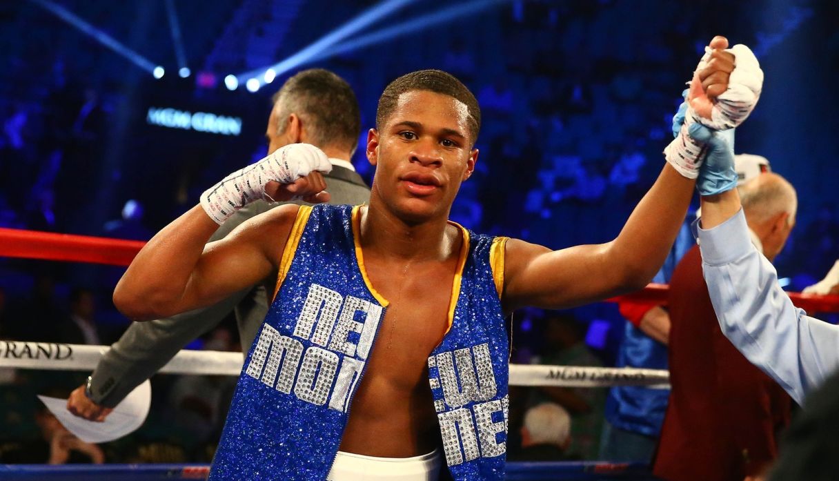 Devin Haney celebrates his win