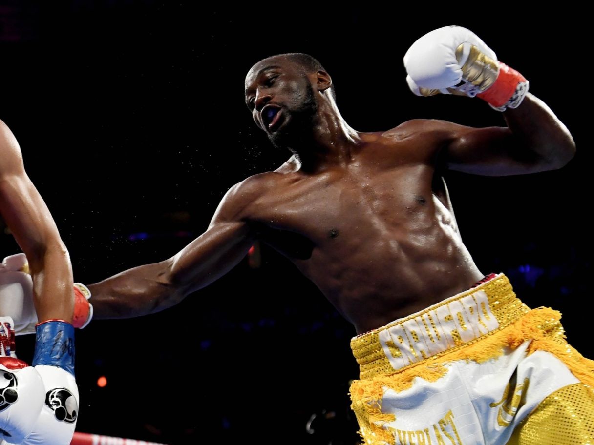 Terence Crawford vs Amir Khan action shot. Sarah Stier-USA TODAY Sports